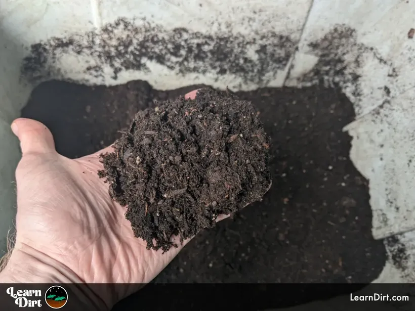 unfinished compost chunky inspected by hand in tote